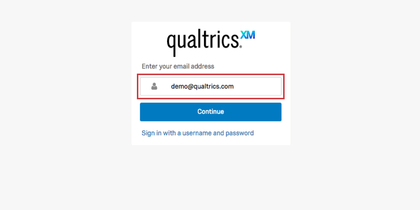 Email address in the field, blue continue button below
