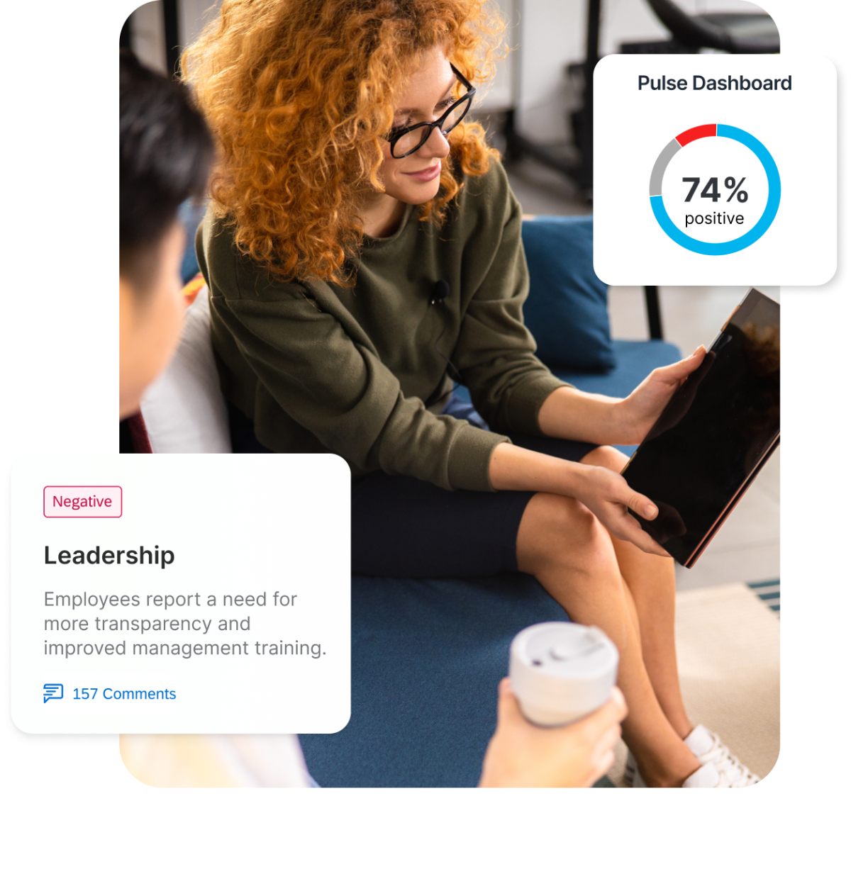 A woman reviews employee feedback on a tablet alongside a Qualtrics Pulse Dashboard showing 74% positive sentiment and a flagged leadership theme with 157 employee comments.